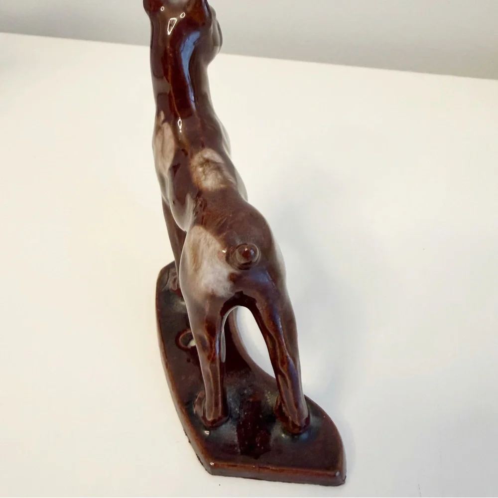 Vintage boxer dog ceramic statue.